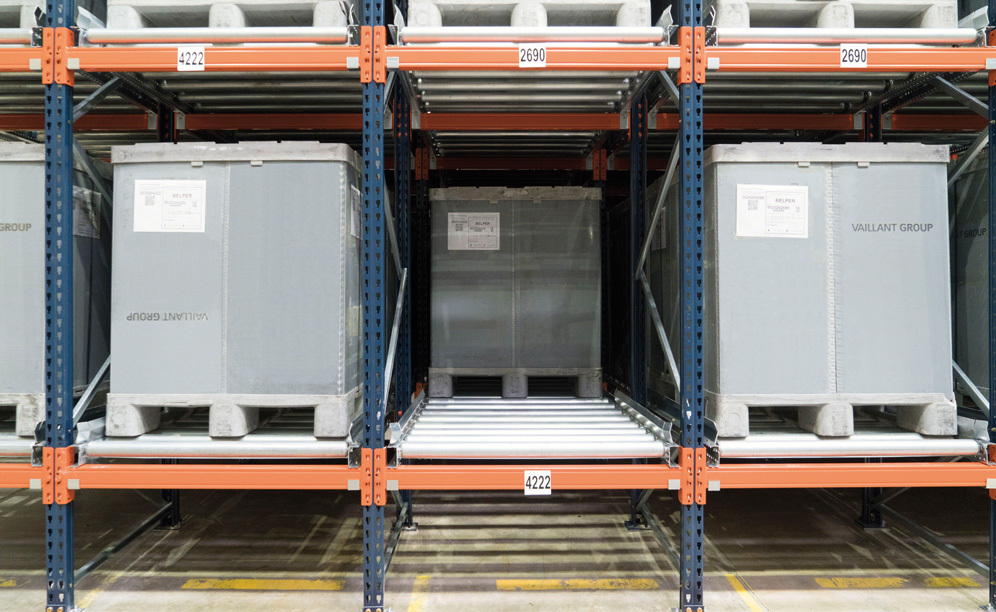 The racks are composed of roller channels with a slight incline that allows gravity flow of the pallets